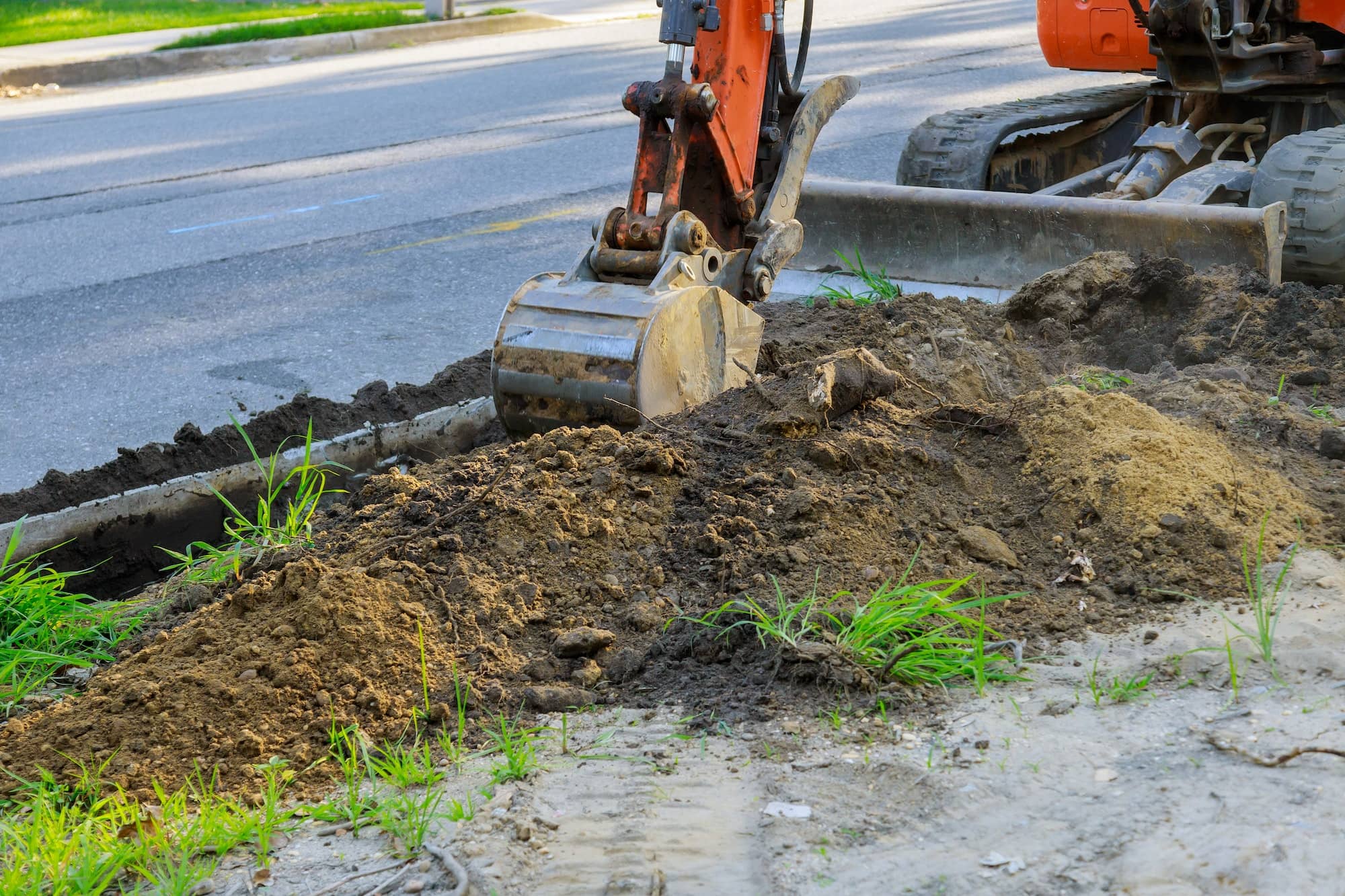 TDS Civil excavator working in an excavation pit on a Langley BC construction site